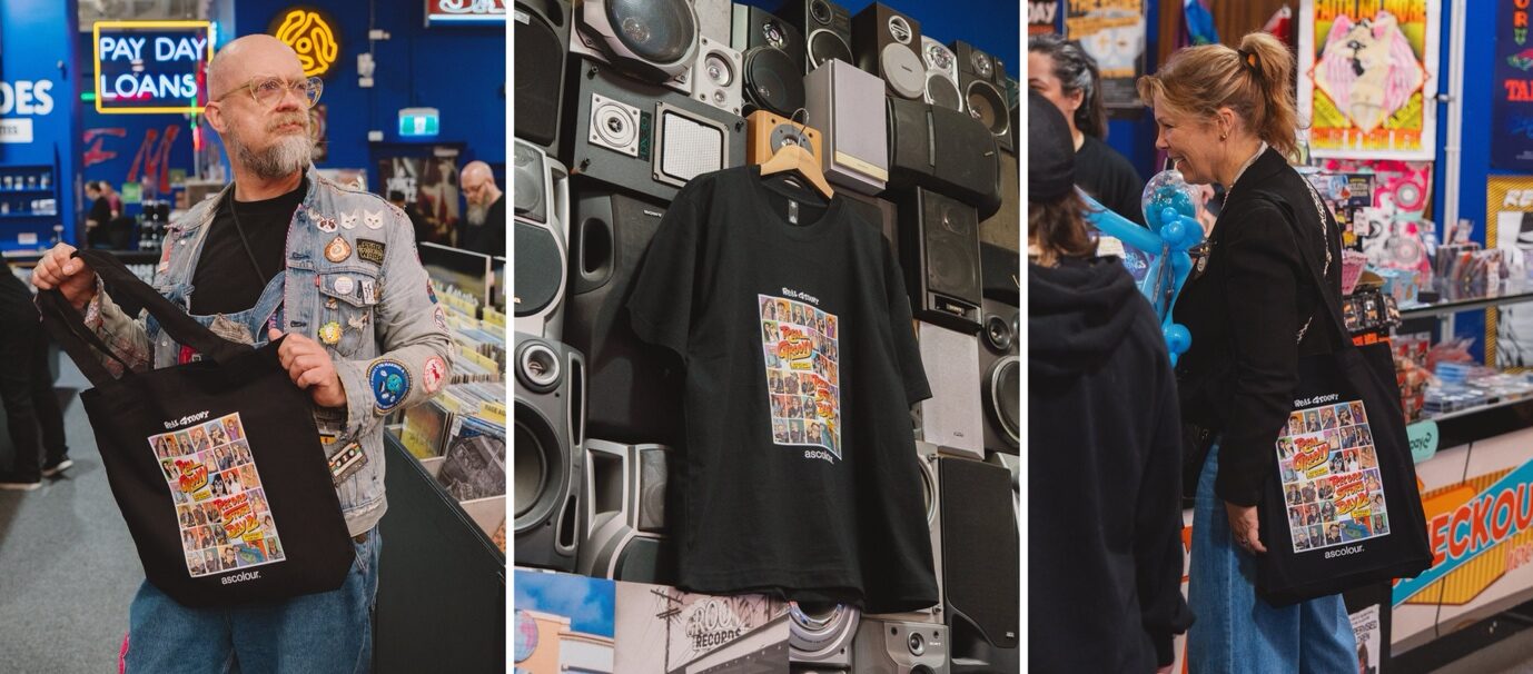 Customers at Real Groovy carrying tees and totes pressed live in store